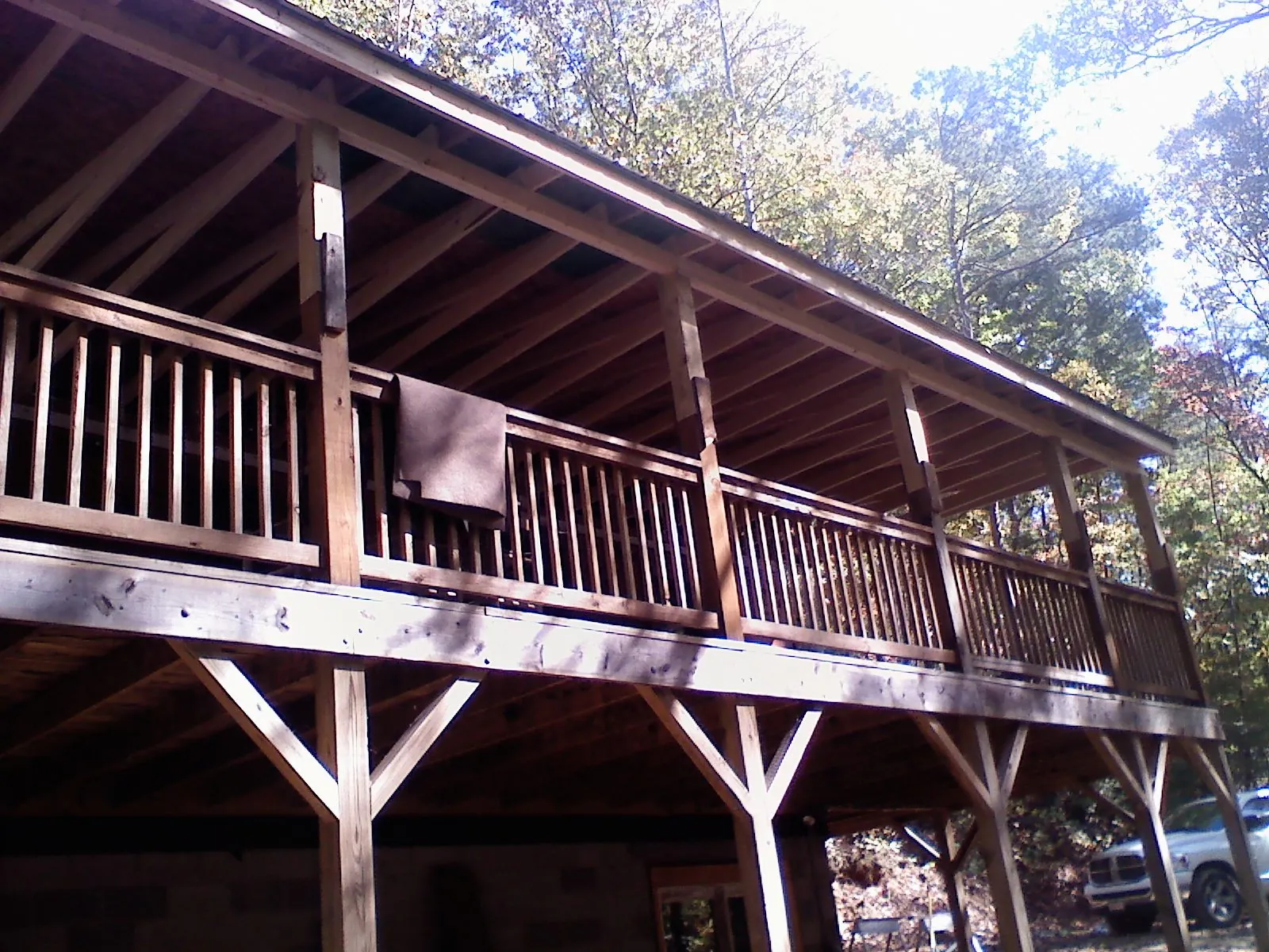 Timber framing under a new elevated porch and deck — Roof Leak Repair in Conesus by Roofing Brothers